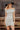 CALVIERA robe à pois blanc