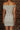 CALVIERA robe à pois blanc