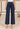 Jean wide leg taille haute bleu brut à boutons dorés – MAELYS