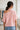 Pull asymétrique rose en maille douce – ROSALIE