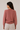 Pull en maille rose avec lien à nouer