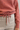 Pull en maille rose avec lien à nouer