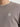 Détail de la maille côtelée du pull beige Chasin homme