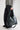Sac à main matelassé noir effet brillant — HELBI