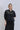 Veste noire effet cuir WITHBLACK pour femme coupe oversize - vue de face